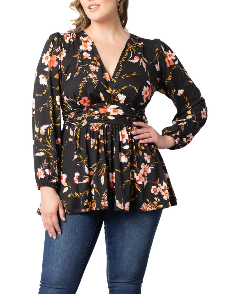 Front of a model wearing a size 0X Leah Long Sleeve Tunic Top in MIDNIGHT GARDEN by Kiyonna. | dia_product_style_image_id:312481